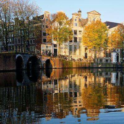 Autumn reflects in the canals in Amsterdam